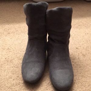 Pair of grey slouch boots.